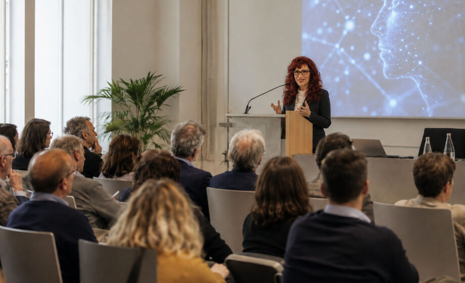 Foto di una sala congressuale mentre si parla di cura, morte e IA con la prof.ssa Testoni sul podio del relatore. Immagine realizzata con IA mediante promt creativo dall'autore dell'articolo.
